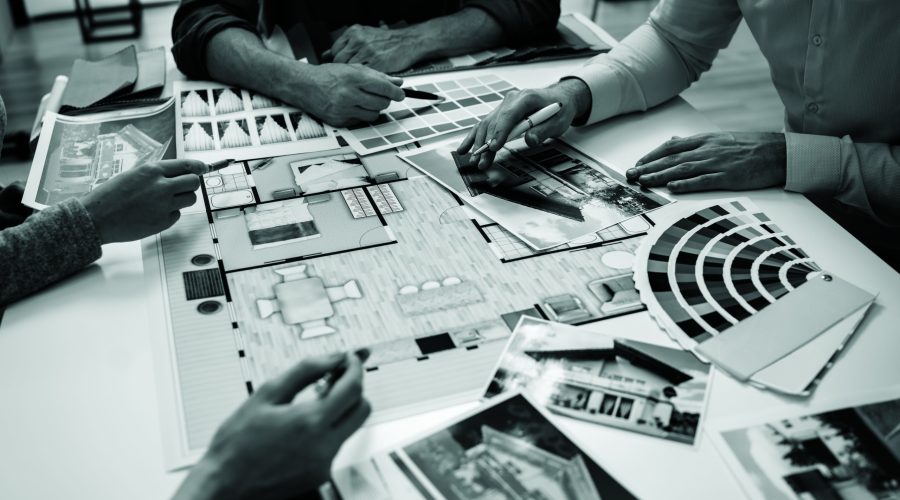 Architects And Designers Working On Color Selection For House